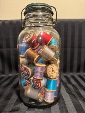 Vintage Hazel-Atlas Glass Jar Filled with Colorful Spools of Thread